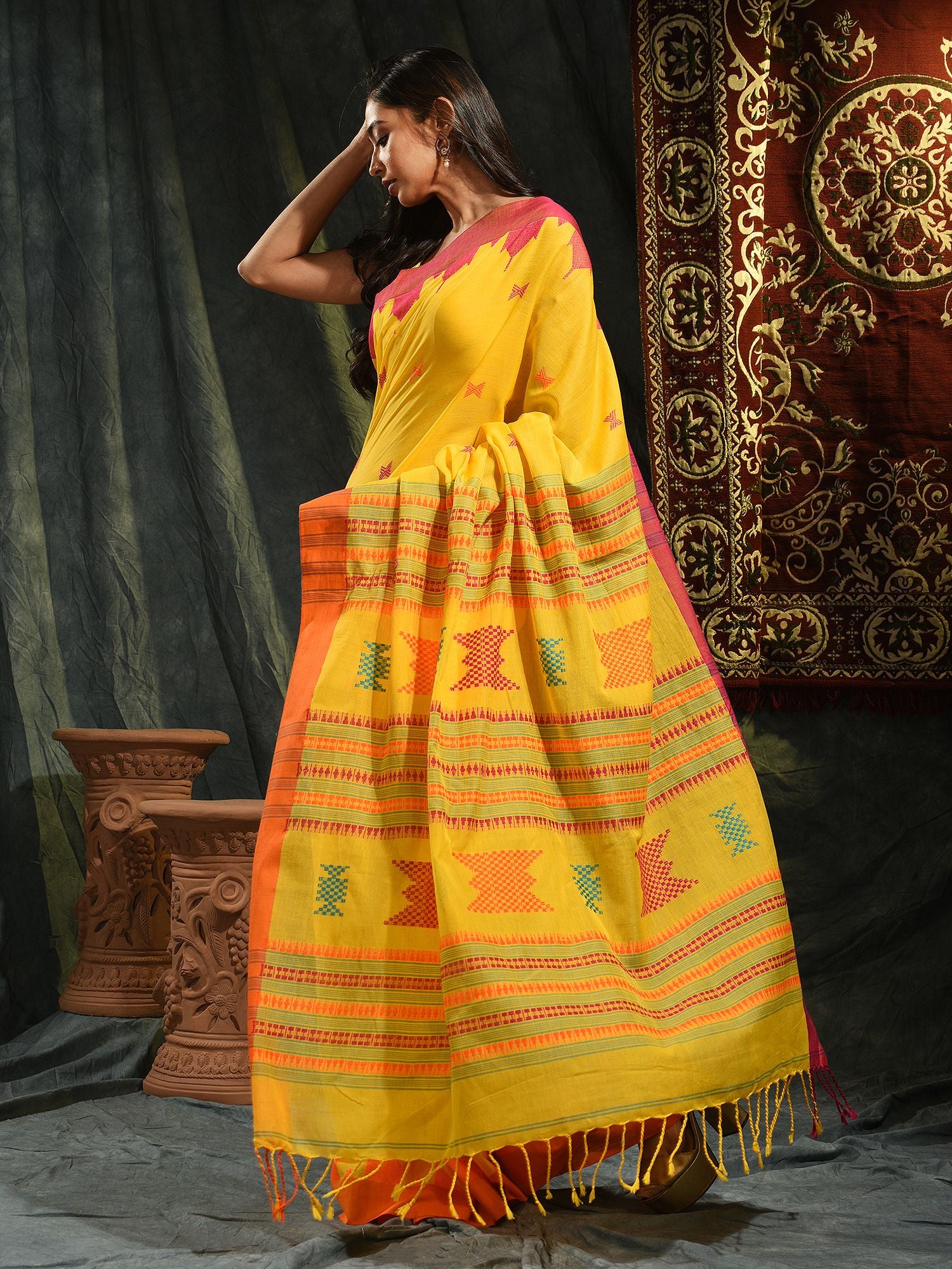 Yellow hand woven Cotton saree with temple border